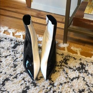 Black and white statement patent ankle boots